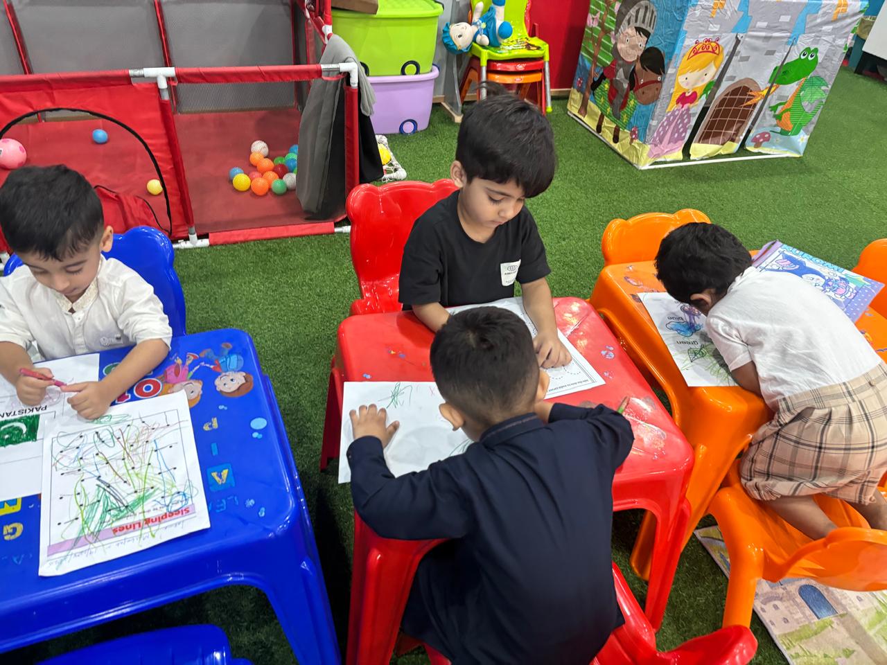 A child building with colourful blocks